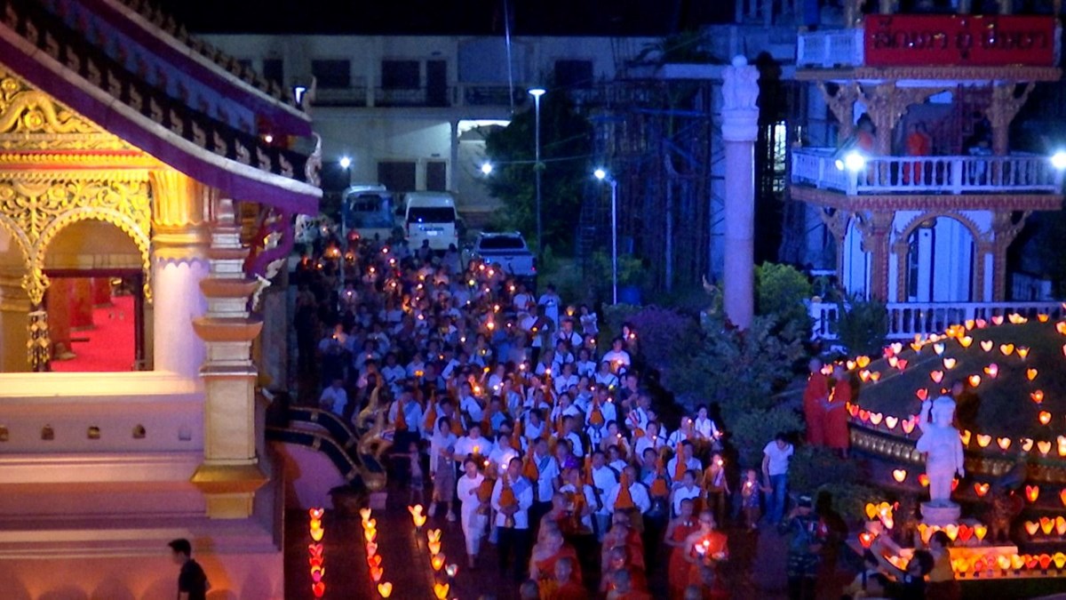 ປວງຊນລາວຮກສາໄດຮດຄອງປະເພນອນດງາມໃນງານບນອອກພນສາ ແລະ ຊວງເຮອທທາວດຈນ - image 2