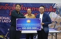 ຫຼາຍພາກສ່ວນ ມອບເງິນສະໜັບສະໜູນທີມນັກກິລແລ່ນ-ລານ ນວ