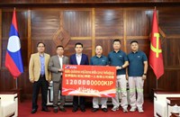 ບໍລິສັດ ຝຸ່ນໂປຕາສ ມອບເງິນ 1,2 ຕື້ກີບ ໃຫ້ແຂວງຄໍາມ່ວນ