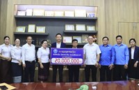 ລັດວິສາຫະກິດຫວຍພັດທະນາລາວ ມອບເງິນ 20 ລ້ານກີບ ສ້ອມແປງໂຮງຮຽນ ມ.ຕົ້ນ ຫ້ວຍໄລ