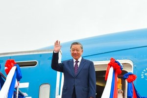 ປະທານປະເທດ ແຫ່ງ ສສ ຫວຽດນາມ ເດີນທາງມາຢ້ຽມຢາມລັດຖະກິດ ທີ່ ສປປ ລາວ