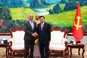 ຄະນະຜູ້ແທນຂັ້ນສູງ ພັກກອມມູນິດປອກຕຸຍການ ຢ້ຽມຢາມ ສປປ ລາວ