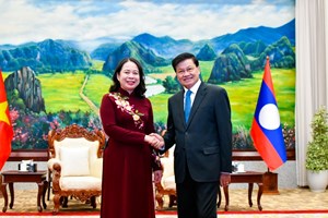 ເລຂາທິການໃຫຍ່ ປະທານປະເທດ ແຫ່ງ ສປປ ລາວ ຕ້ອນຮັບການເຂົ້າຢ້ຽມຂໍ່ານັບຂອງ  ຮອງປະທານປະເທດ ແຫ່ງ ສສ ຫວຽດນາມ