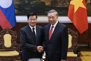 ເລຂາທິການໃຫຍ່ພັກປະຊາຊົນປະຕິວັດລາວ ພົບປະ ເລຂາທິການໃຫຍ່ພັກກອມມູນິດຫວຽດນາມ