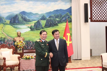 ສະຫາຍ ທອງລຸນ ສີສຸລິດ ຕ້ອນຮັບຮອງລັດຖະມົນຕີ​ກະຊວງ​ປ້ອງກັນ​ປະເທດ​ຫວຽດນາມ​