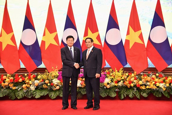 ເລຂາທິການໃຫຍ່ ປະທານປະເທດ ແຫ່ງ ສປປ ລາວ ພົບປະກັບ ນາຍົກລັດຖະມົນຕີ ແຫ່ງ ສສ ຫວຽດນາມ