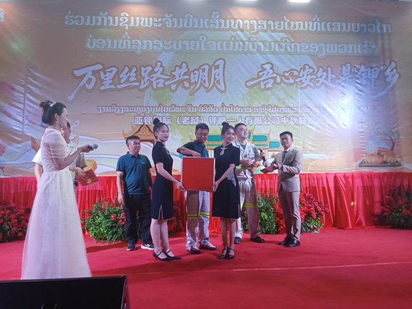 ບໍລິສັດ ຝຸ່ນໂປຕາສ ອາຊີ-ໂປຕາສ ສາກົນ (ລາວ) ຈໍາກັດຜູ້ດຽວຈັດງານລ້ຽງສະຫຼອງບຸນໄຫວ້ພະຈັນ